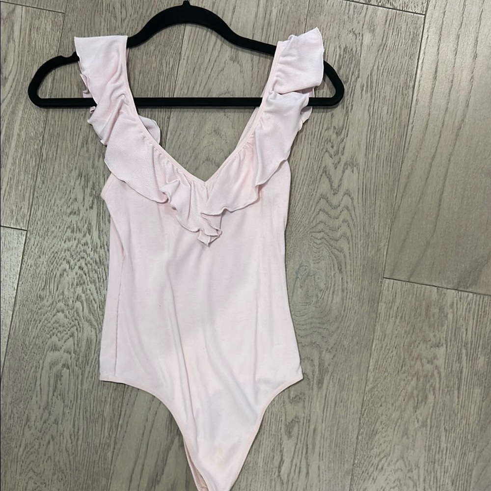 Wilfred Pink Bodysuit with Ruffled Neckline and Deep V-Shape